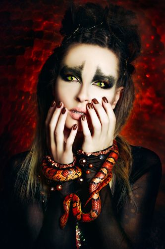 Woman is at once Apple and Serpent