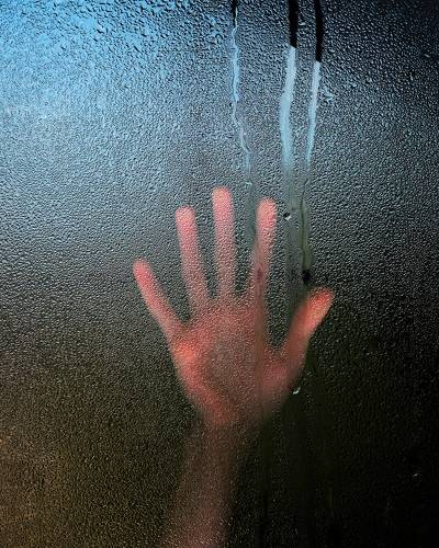 behind glass
