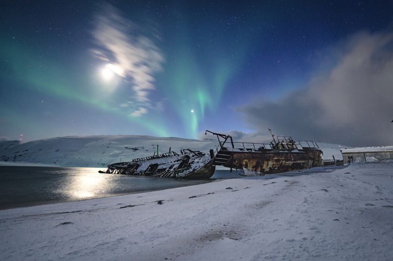 tundra; transportation; graveyard of ships; cloudy sky; tourism; beautiful; russian; outdoor; scenery; peninsula; barents; ocean; background; arctic circle; arctic ocean; bay; kola; northern; fishing boat; aurora; russia; ship; landscape; kola peninsula;  broken vessels on the coast of the Barents sea фото превью