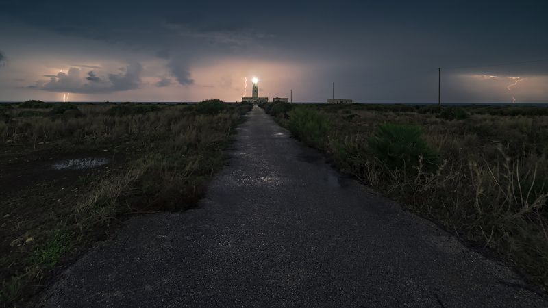 Lightning and lightning bolts at the lighthouse Cape \