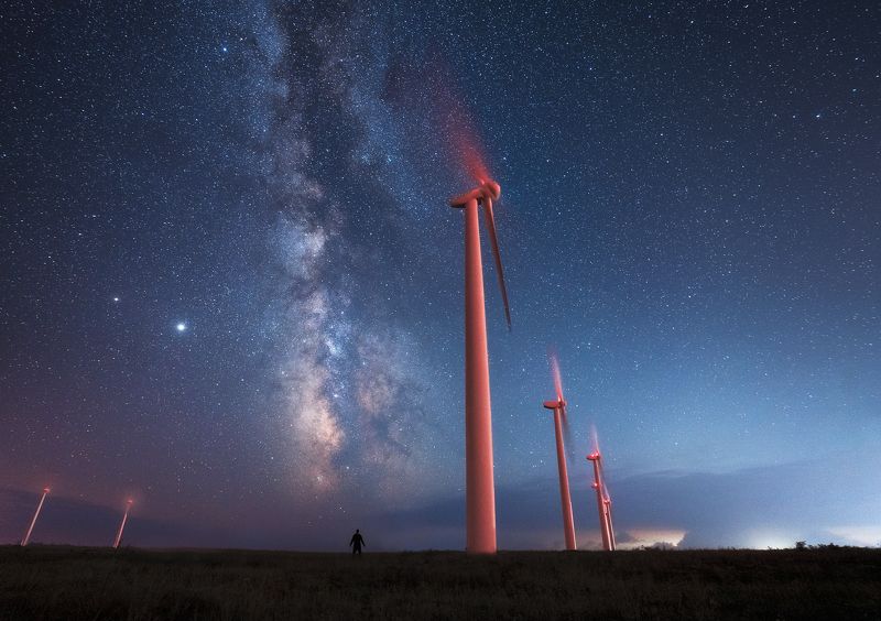 Night with wind turbines and Milky way core фото превью