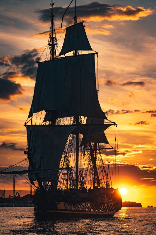 frigate, sea, sail, transportation, boat, ship, cruise, vessel, sailboat, historic, nautical, navigation, water, wooden, voyage, vintage, tall, sky, old, navy, wind, travel, maritime, galleon, transport, ancient, adventure, yacht, wave, marine, mast, anti The Frigate Shtandar in calm weather sailing sunset time Riga Latvia фото превью