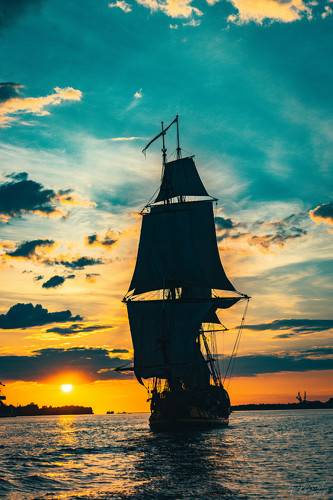 The Frigate Shtandar in calm weather sailing sunset time Riga Latvia