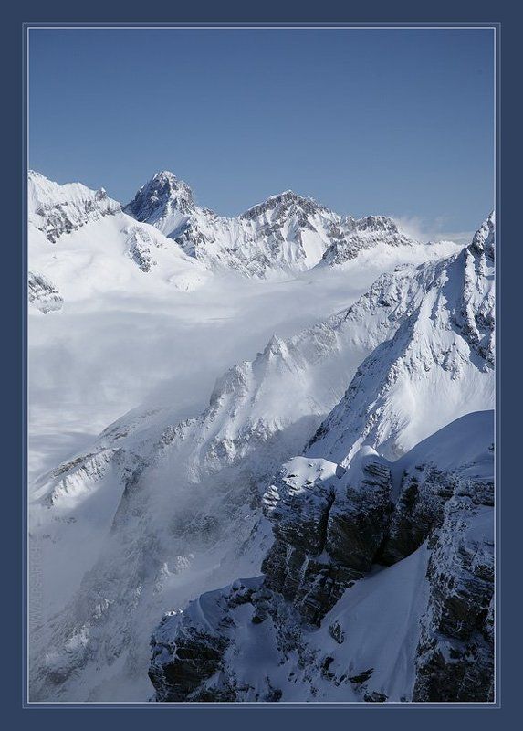 альпы, горы, зима Под ногами - облака. фото превью