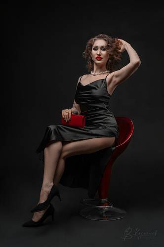 Small red clutch & small black dress