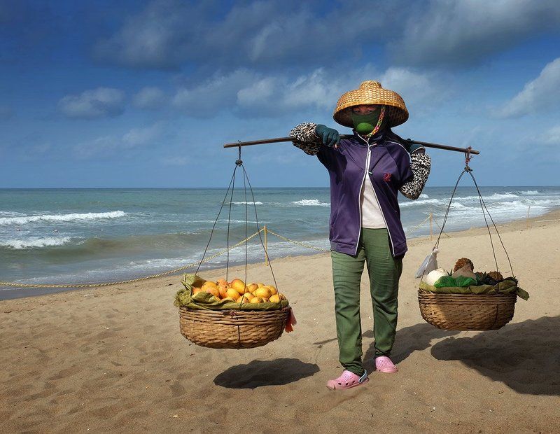 хайнань,продавец фруктов Продавец манго фото превью