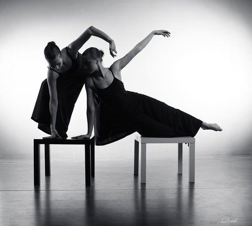 Dream about sitting on two chairs