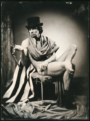 Portrait of a man in a single sock.