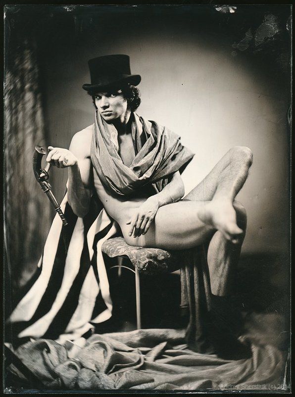 Portrait of a man in a single sock. фото превью