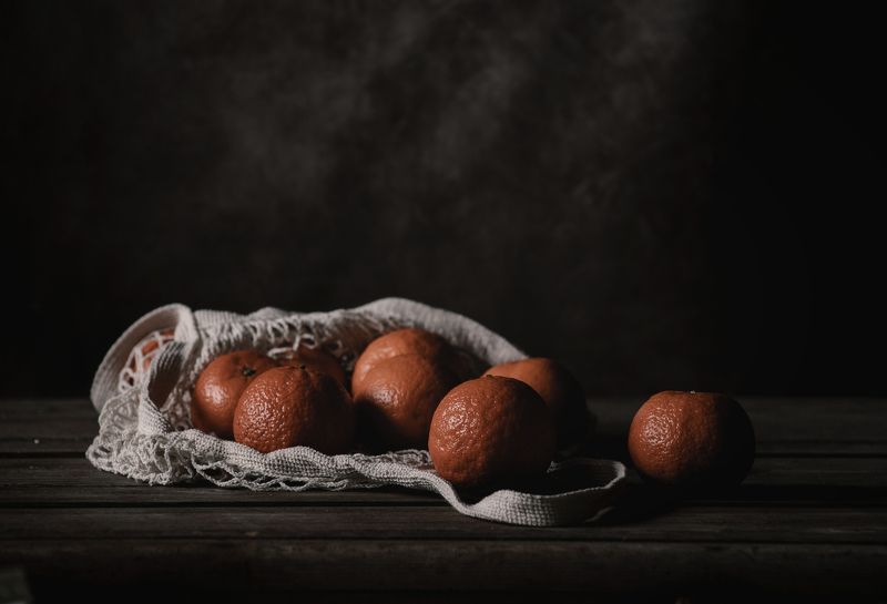 Мандарины в авоське фото превью