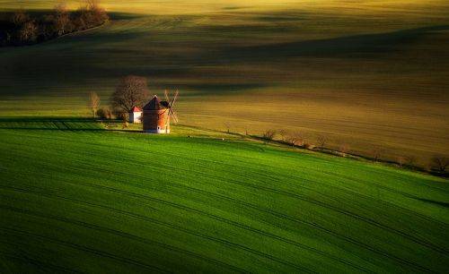 Historical windmill in the beautiful surroundings of South Moravia.