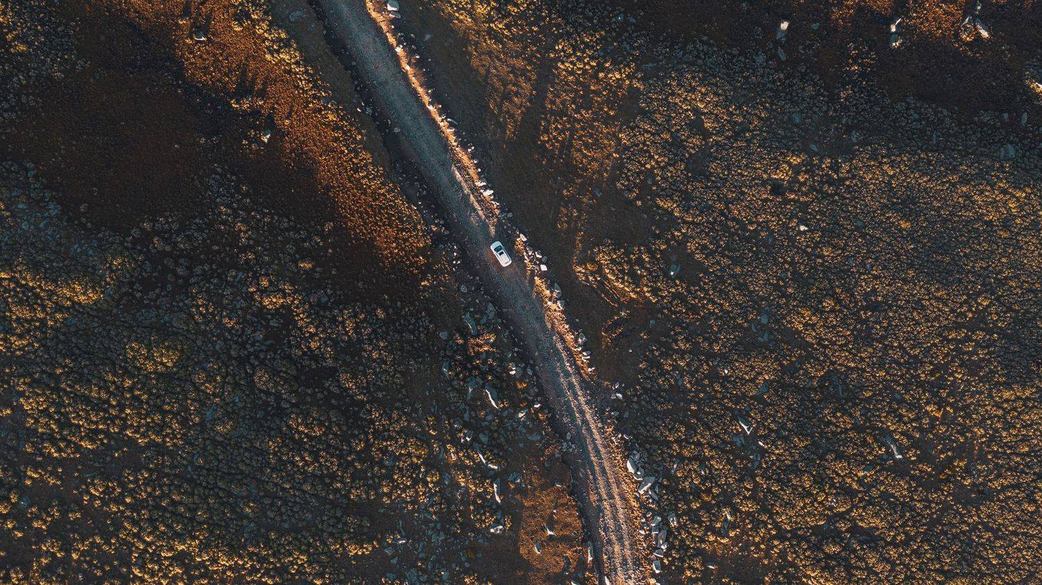aerial, bird\'s eye view, plateau, nature, car, road, rocks, bushes, rusty, sunset, sunrise, golden hour, shadows, Druz Denys
