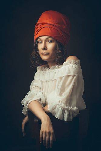 The girl in the red headdress