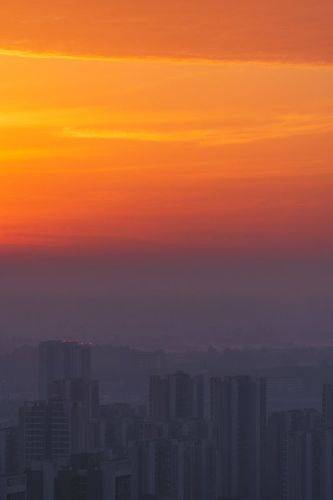 Misty Dawn Metropolis: A Colorful Urban Awakening