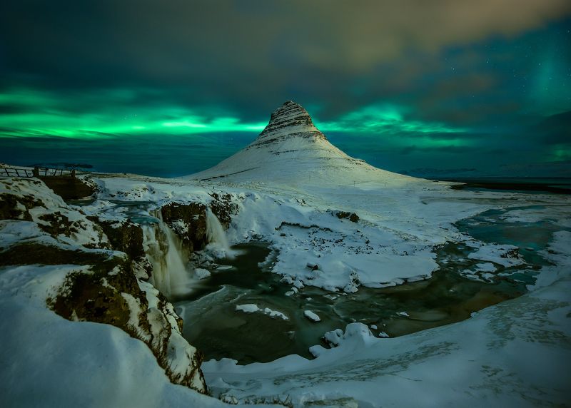 2015, Astronomy, Atmospheric Mood, Aurora Borealis, Beauty In Nature, Cloud - Sky, Color Image, Dramatic Sky, Flowing Water, Horizontal, Iceland, Illuminated, Mountain, Mountain Range, Nature, Night, No People, Outdoors, Photography, Rock - Object, Water, Kirkjufell in winter фото превью