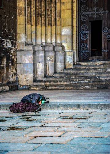 Beggar at the church 1