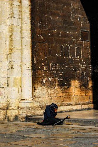 Beggar at the church