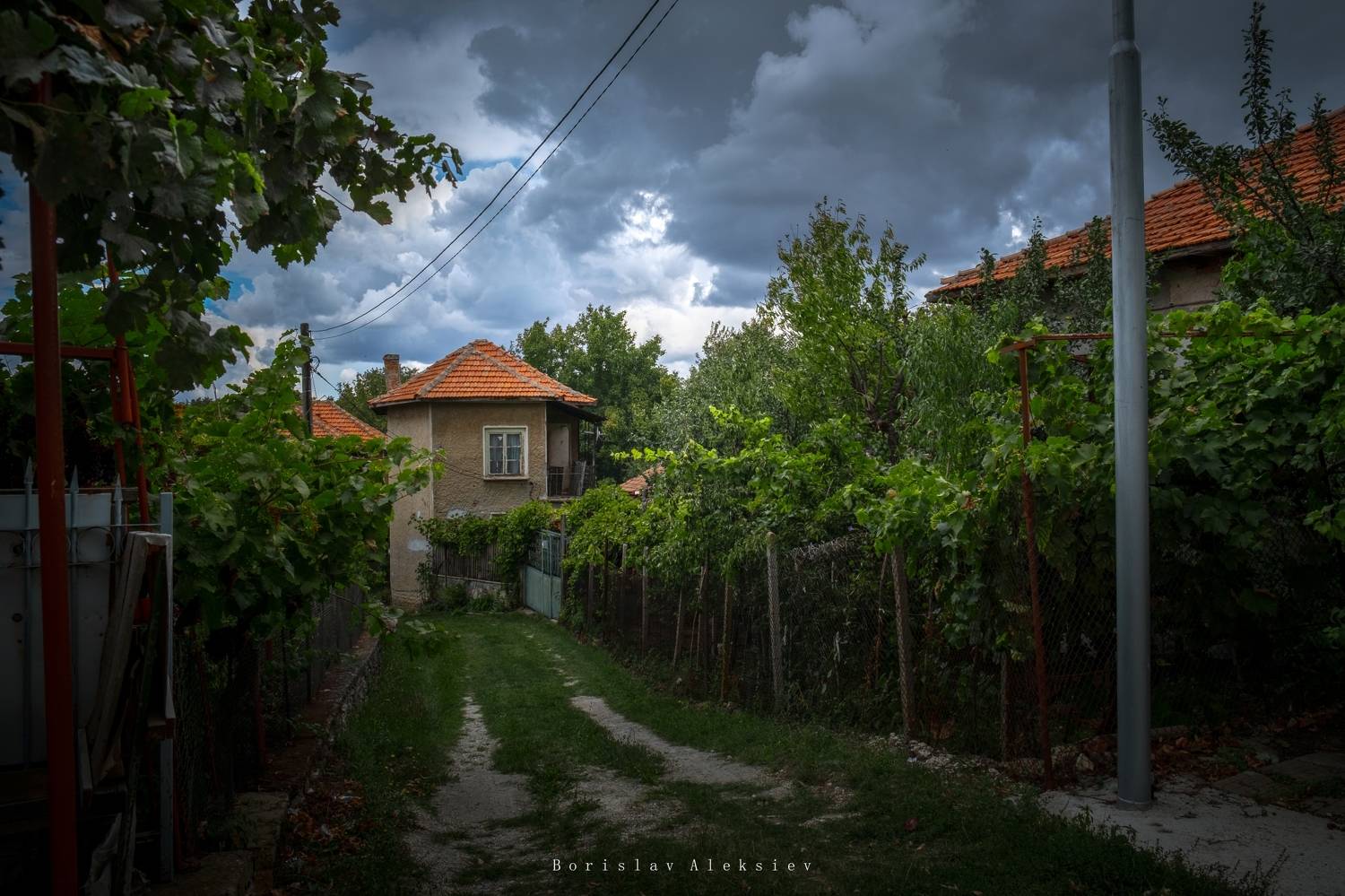 old village,storm,house,clouds,light,dark,building,plant,green,tree,, Алексиев Борислав
