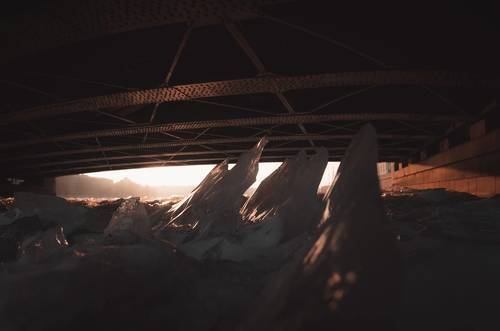 Under the bridge.