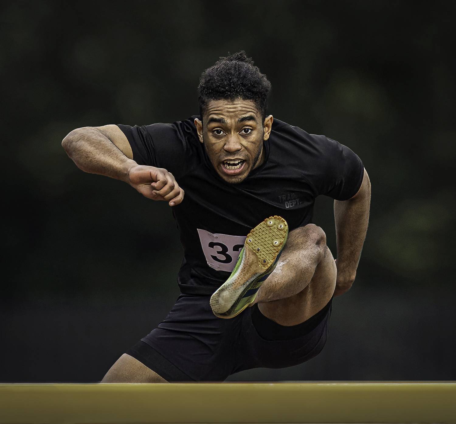Chris Grimes Hurdling for gold. Автор: Eddie Leach , Eddie Leach