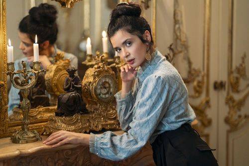 Woman at the Mantelpiece