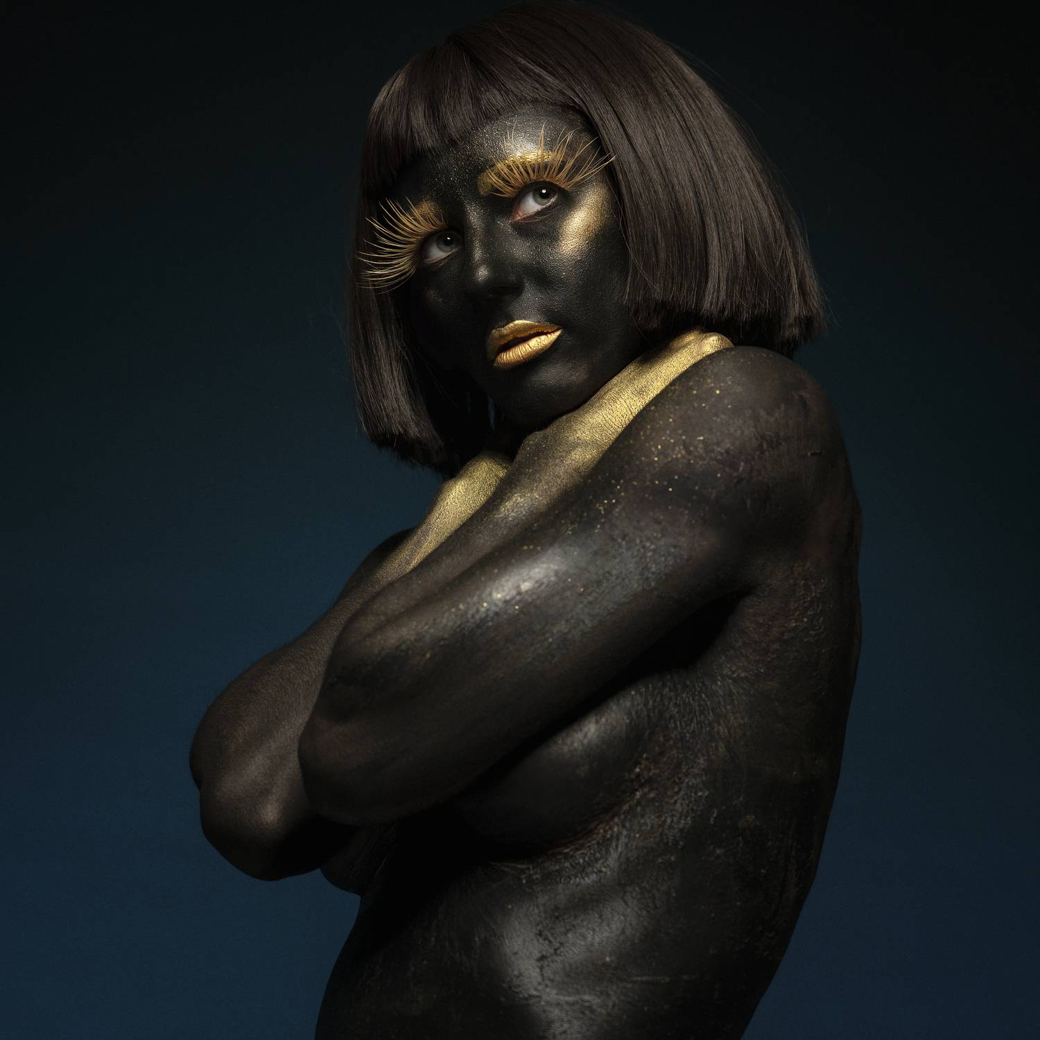 art, beautiful woman, beauty, black and gold, creative, dreaminess, eyelashes, eyes, female, femininity, grace, hair, hands, individuality, indoors, light, lips, looking, makeup, one person, portrait, pose, shadow, side view, studio shot, young woman, Alex Tsarfin