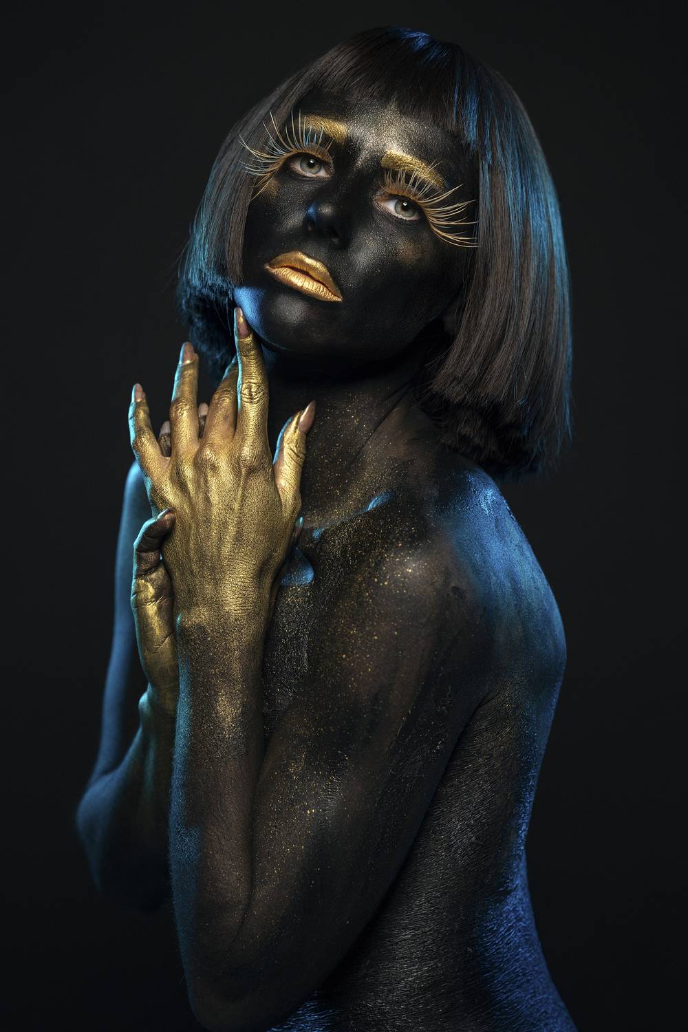 art, beauty, black and gold, blue, creative, dreaminess, elegance, female, femininity, grace, human face, individuality, indoors, light, looking at camera, makeup, one person, portrait, pose, shadow, side view, standing, studio shot, young woman, Alex Tsarfin