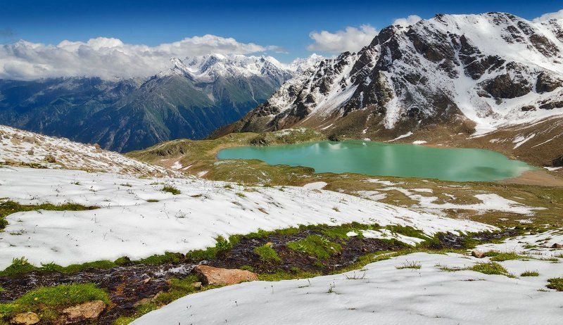 Таял июльский снег фото превью
