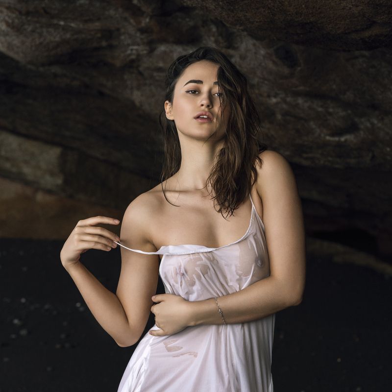 beautiful woman, beauty in nature, body pose, cave, elegant pose, femininity, front view, grace, intimate portraiture, looking at camera, one person, outdoors, peignoir, portrait, rocks, seductive appeal, sensuality, standing, wet clothes, young woman Cave of Gentle Grace фото превью