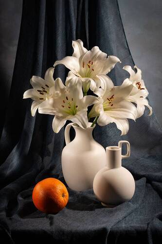 С апельсином.