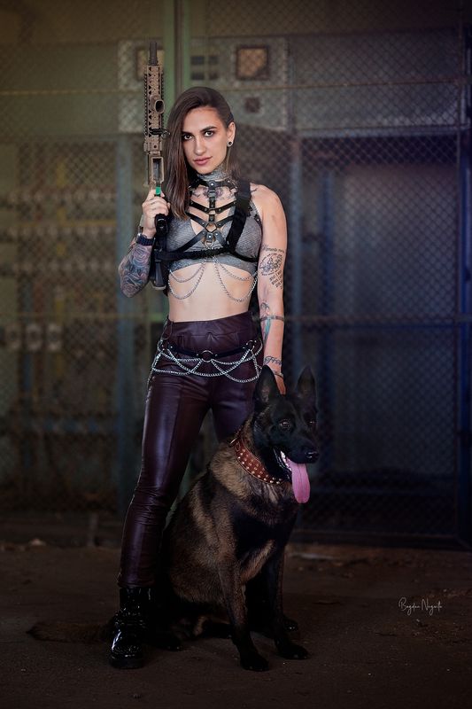 strong woman, conceptual photography, themed photoshoot, post-apocalyptic, alternative style, tattoos, guard dog, attitude, urban fashion, visual story, guardian, wasteland, photographic art, artistic portrait, industrial setting, chains, visual storytell Guardian of the Wasteland фото превью