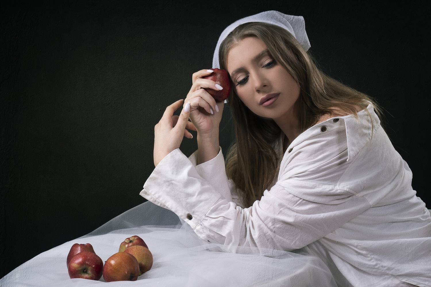 portrait, woman, apple, temptation, studio photography, fine art, contemplative, soft light, white clothing, symbolism, still life, emotion, classic beauty, renaissance style, visual storytelling, artistic pose, silence, introspection, Bogdan Negoita