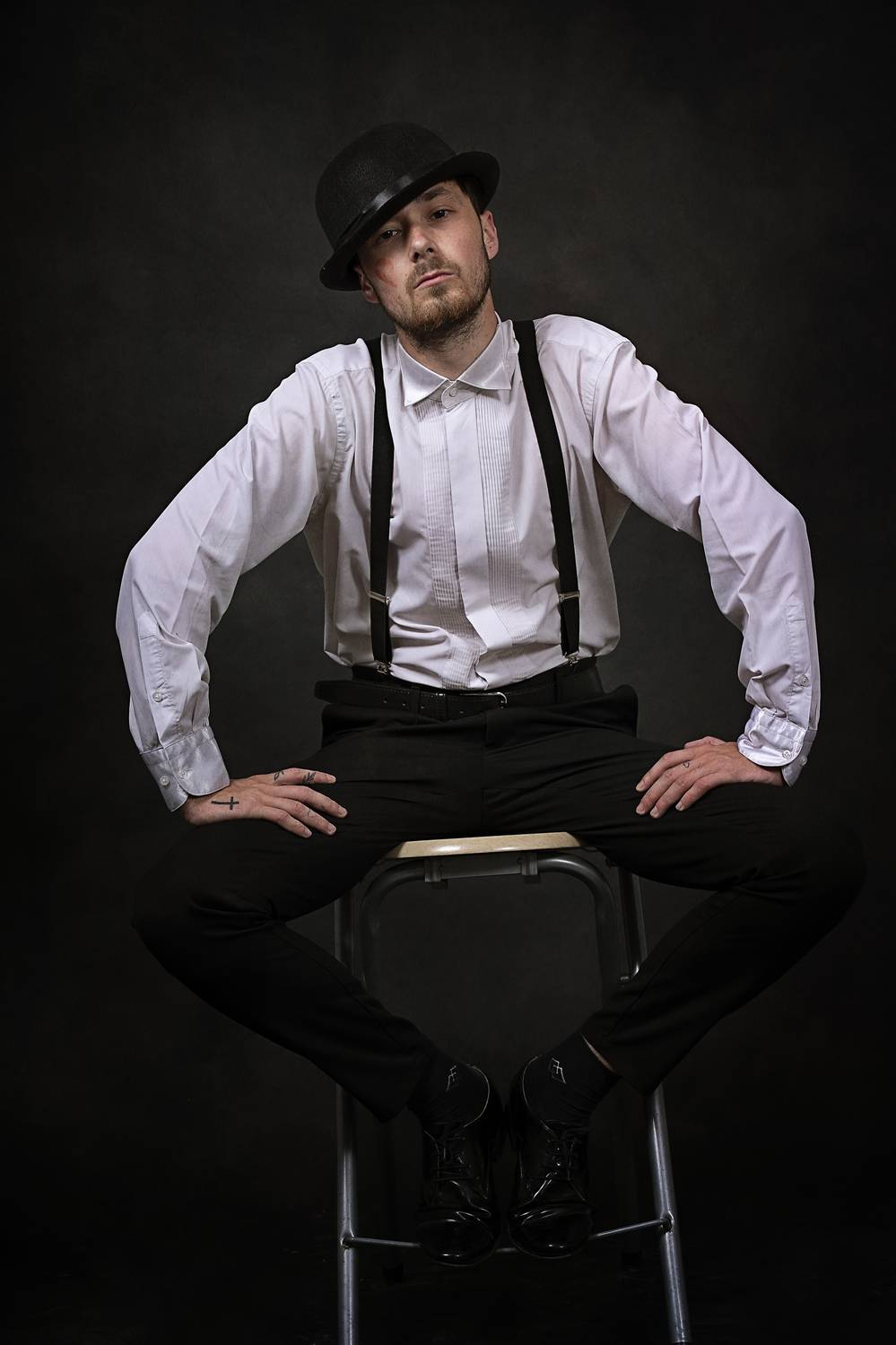 portrait, man, hat, suspenders, vintage style, theatrical, moody lighting, retro fashion, expression, character study          ask chatgpt, Bogdan Negoita