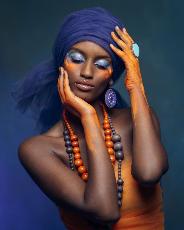 amber accents, artistic portrait, beautiful woman, blue backdrop, cinnamon shadows, delicate pose, desert muse, eastern adornment, exotic elegance, femininity, front view, golden hues, makeup, oriental portrait, turban, vintage orientalism, young woman Mirage of the Painted Princess фото превью