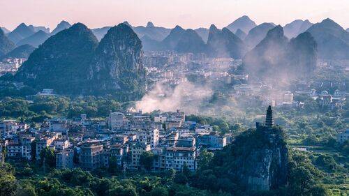 Amidst the misty peaks and forests