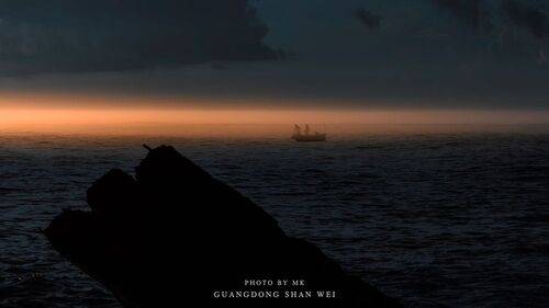 Evening Sea Fishing Boats: Companions in the Faint Light