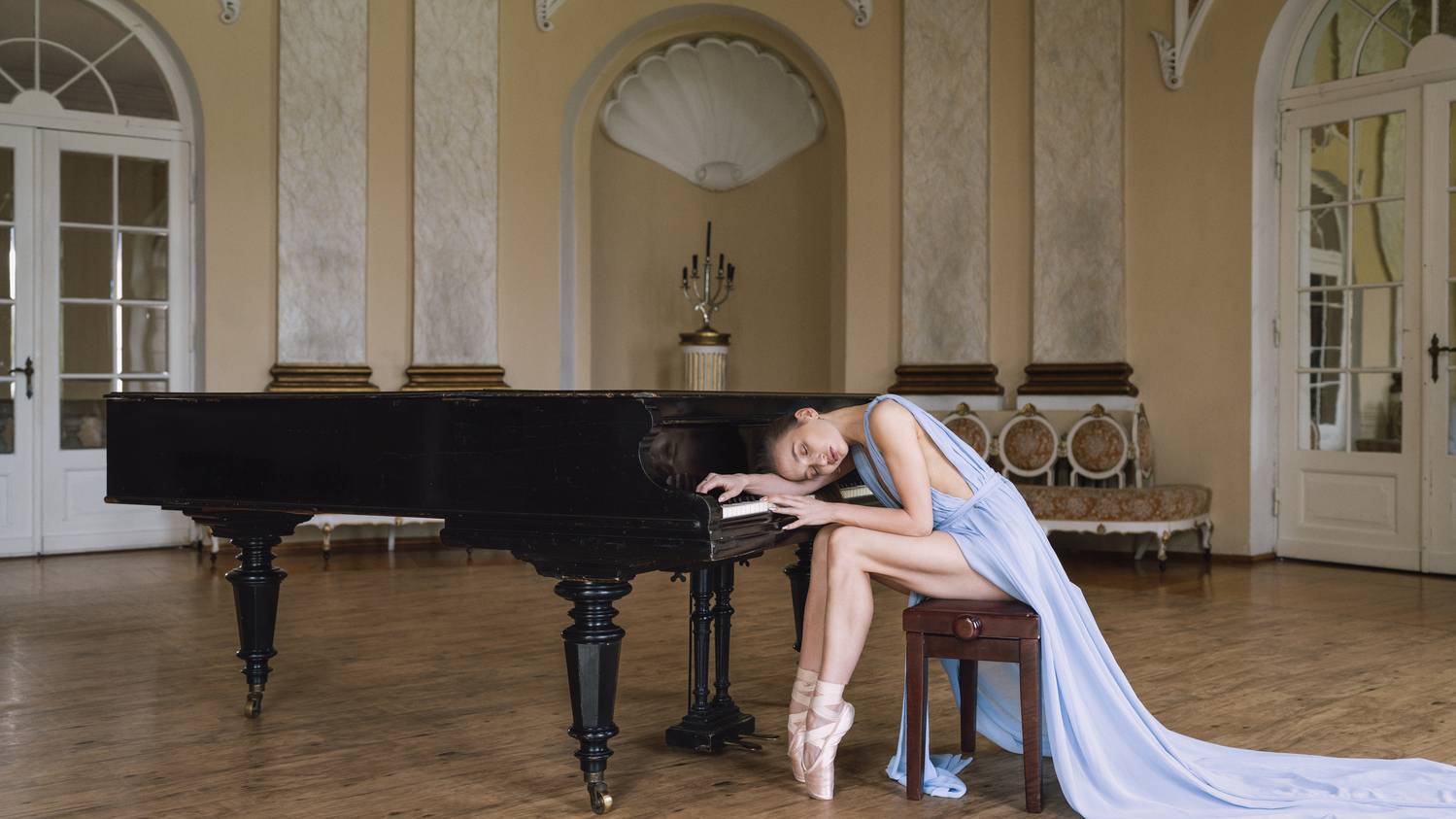 ballet grace, baroque interior, blue gown, dreamy atmosphere, elegant pose, expressive stance, feminine presence, graceful stillness, grand piano, muted palette, poetic sensuality, romantic aesthetic, serene mood, subtle emotion, vintage setting, Alex Tsarfin