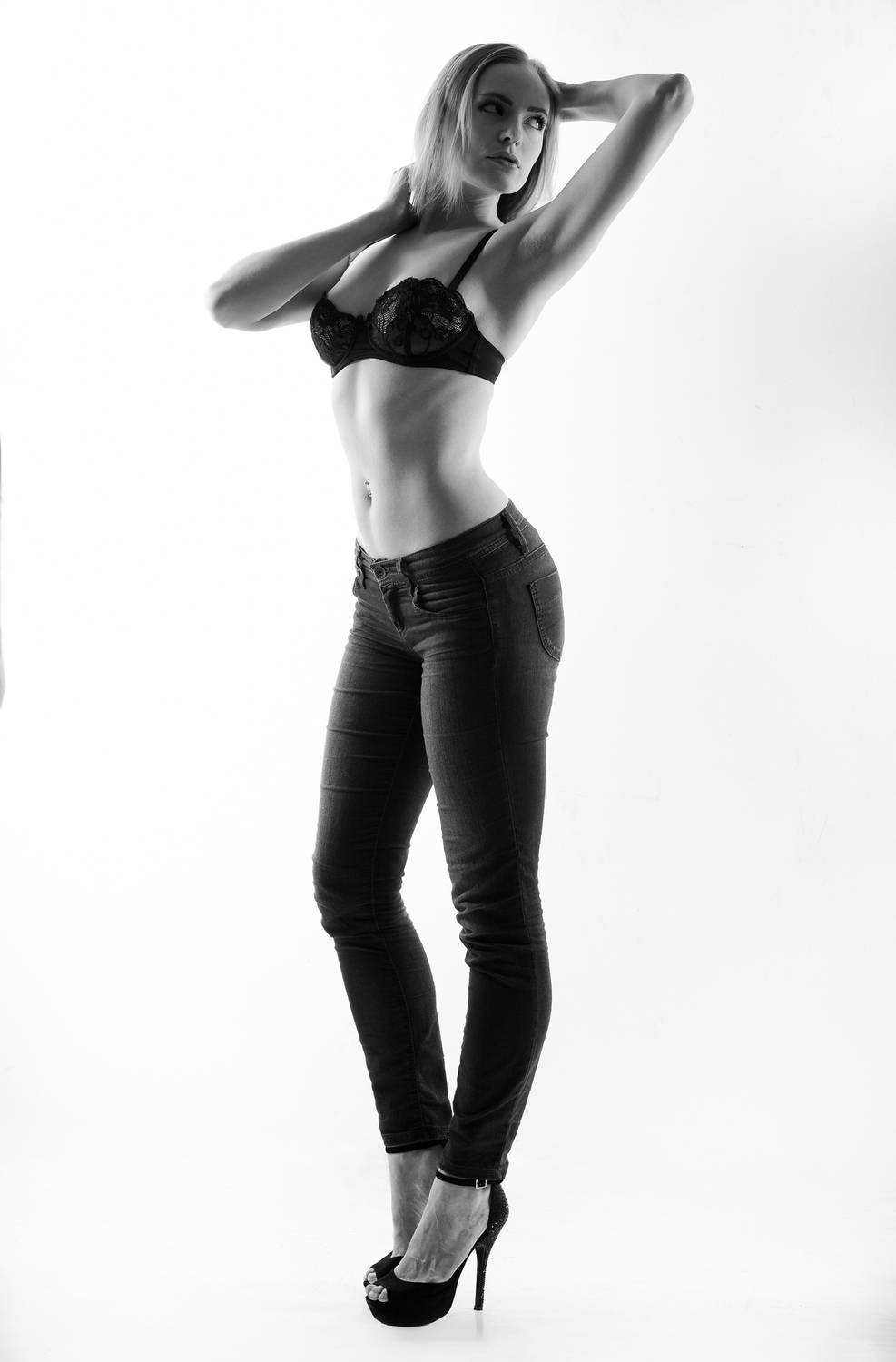 monochrome, black, white, studio, fashion, model, confident, pose, minimalist, clean, classic, timeless, jeans, crop, top, casual, elegant, shadow, lighting, contrast, contemporary, style, chic, sophisticated, editorial, Erik Rozman