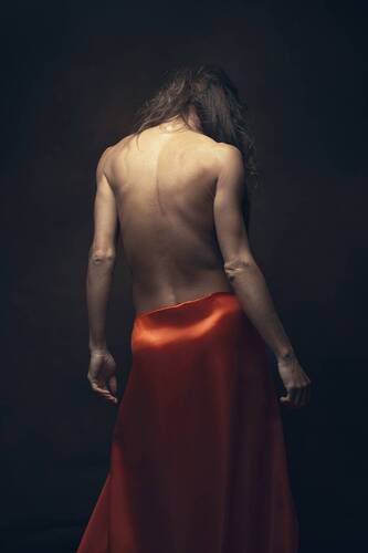 Female in red skirt