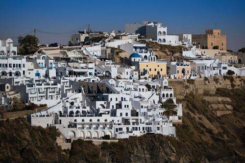 Clinging to the Caldera in Fira