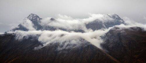 В облачной мантии