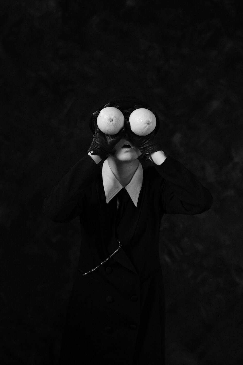 conceptual photographer, surrealism, magritte, portrait with oranges, art photography, black and white, Михаил Сергеевич