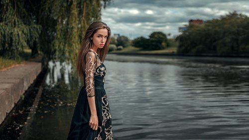 Мила