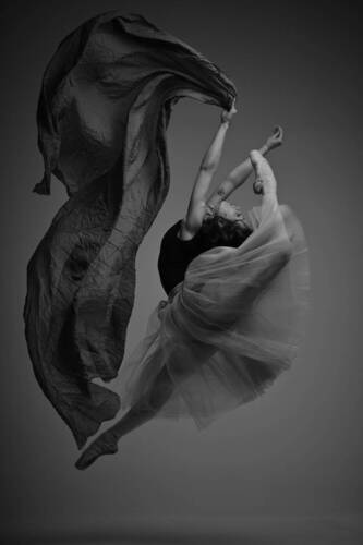 Young ballet soloist Alina Firsova in a graceful flight