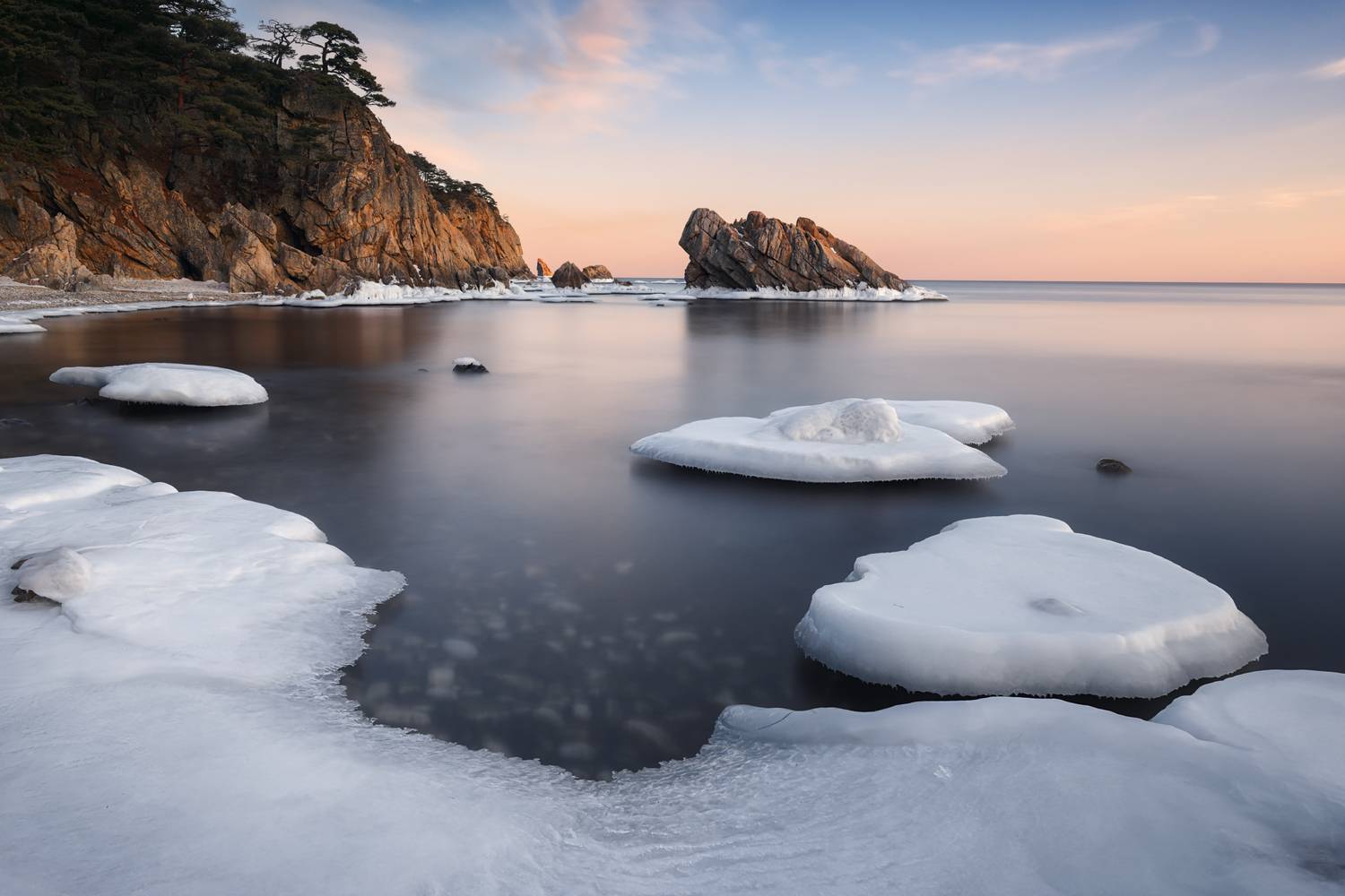 ice, frozen sea, winter, rocks, cliffs, sunset, seascape, ice floes, coastal, landscape, nature, cold, rocky coast, peaceful, serene, winter landscape, twilight, scenic, natural, long exposure, stillness, пейзаж, зима, море, приморье, лед, закат, сумерки,, Андрей