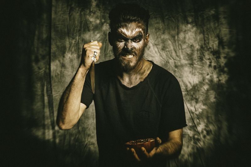 portrait, male, horror, cinematic, dark, character, makeup, facepaint, knife, blade, studio, lowkey, moody, dramatic, conceptual The Ritual of Forgotten Hungers (RakHaYom 33) фото превью