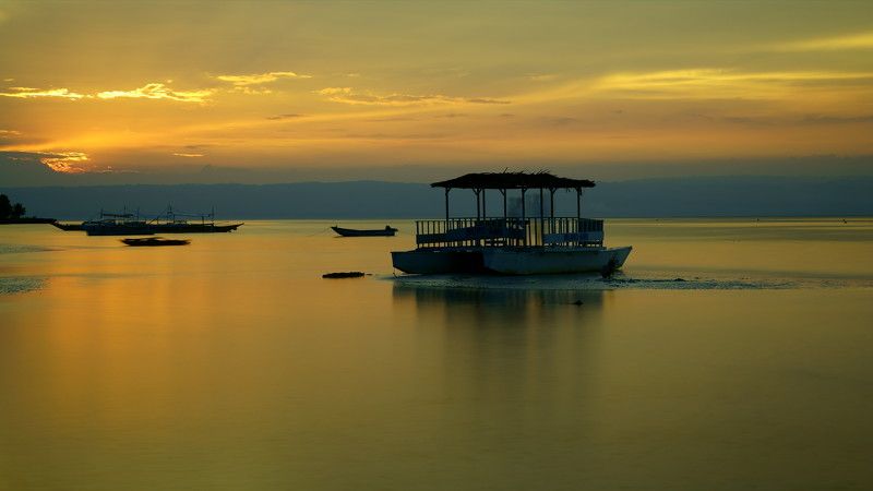 asia,philippines,bohol island,sea,seascape,sunset,boat,horizontal,light,cloud,reflection,silhouette Sunset in Bohol Island фото превью