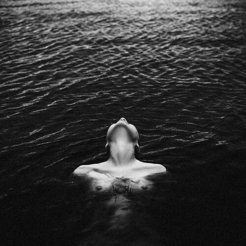 The surface reflects. The depths reveal.
