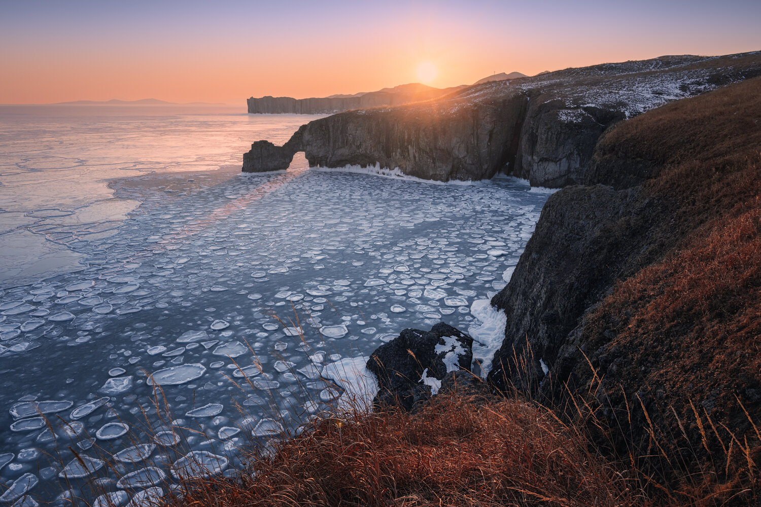 Ледяная мозаика. Автор: Андрей ice, winter, sunset, cliffs, natural arch, golden hour, seascape, landscape, nature, wilderness, outdoor, пейзаж, море, зима, лед, приморье, закат, Андрей