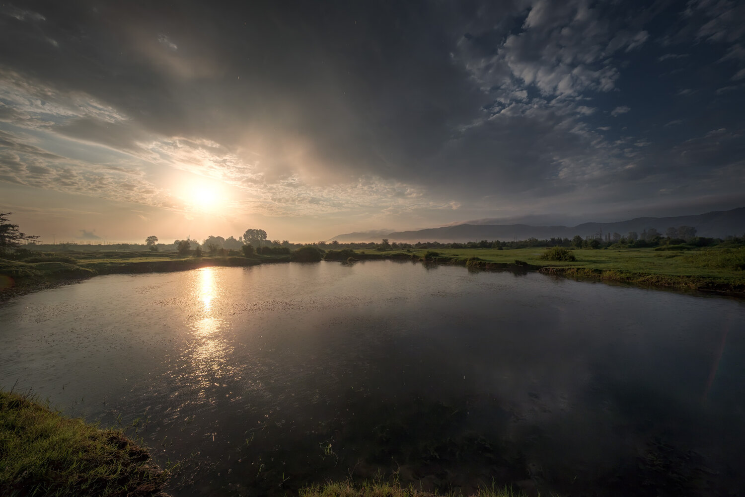 Sun And Rain. Автор: Андрей Чиж sunrise, down, sun, rain, lake, pasture, sky, clouds, summer, morning, fog, haze, mountains, nature, weather, landscape, scenery, travel, outdoors, caucasus, sakartvelo, lanchkhuti, guria, georgia, chizh, Андрей Чиж